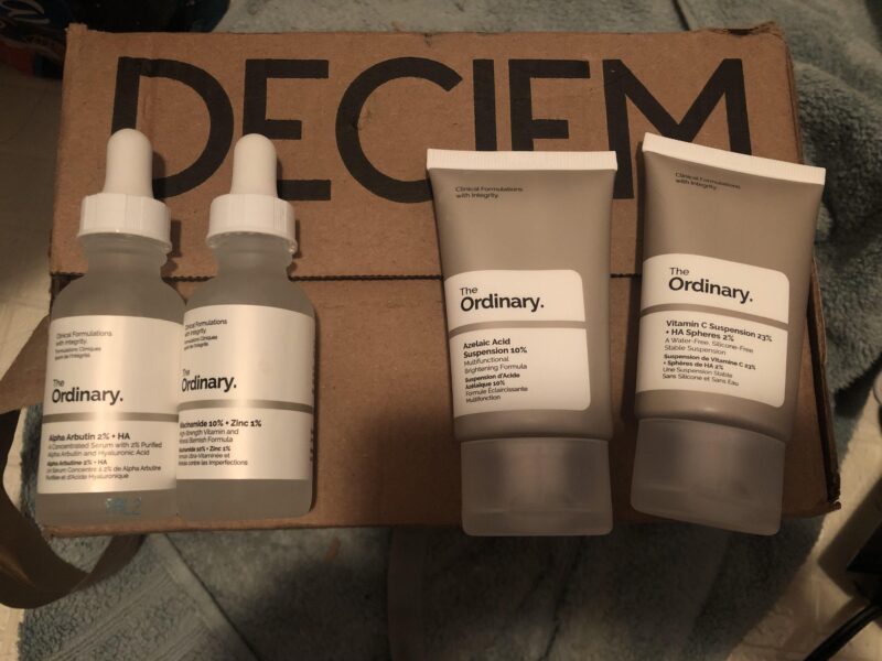 Azelaic Acid, Niacinamide & Alpha Arbutin serum bottle.